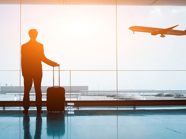 man standing in airport